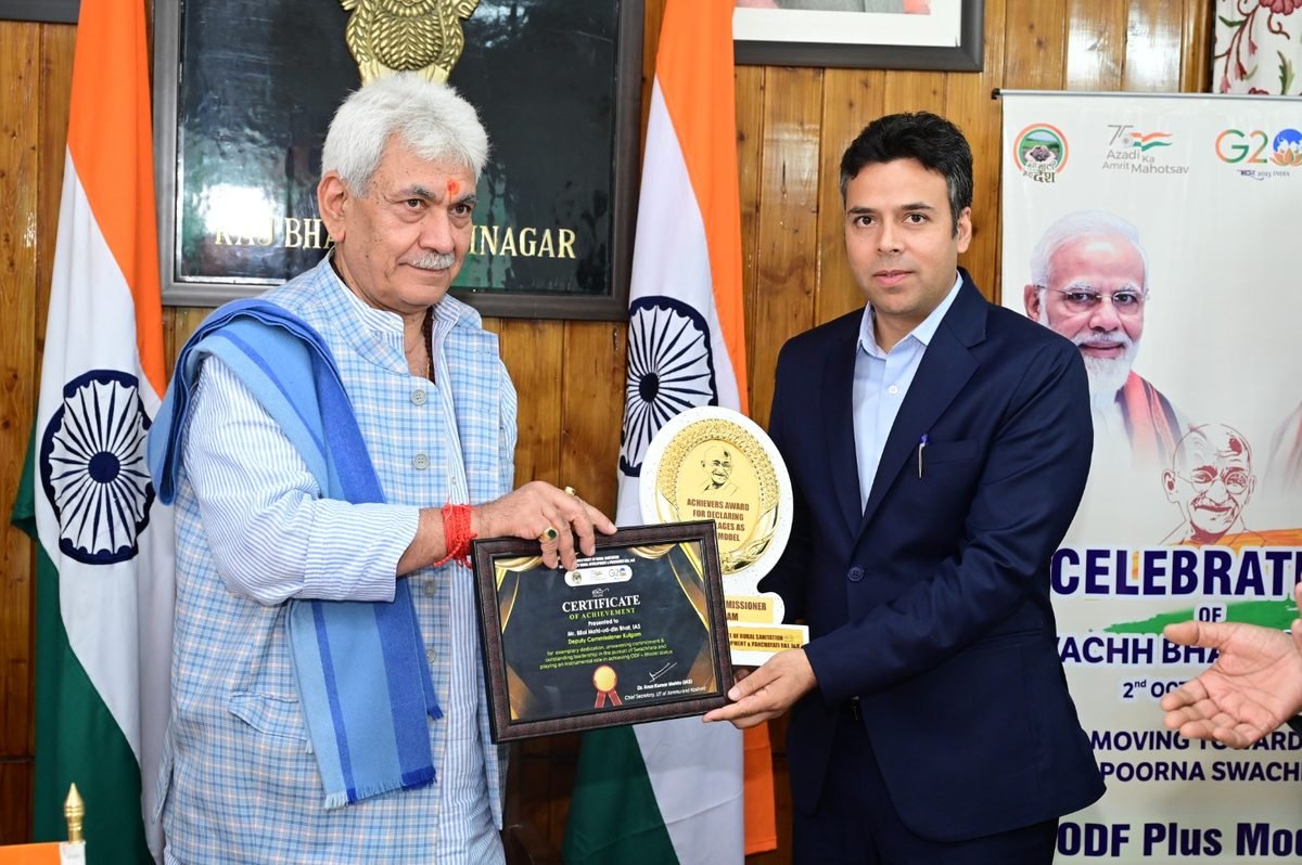 Lieutenant Governor Manoj Sinha presents the Certificate of Achievement to Dr Bhat, Raj Bhawan, October 2023